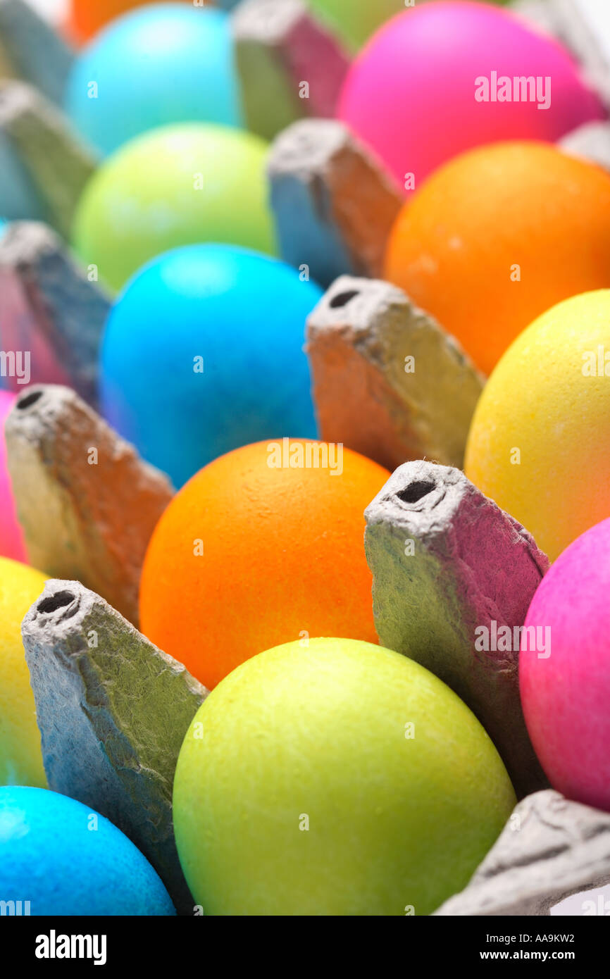 Colorful easter eggs in egg carton. Stock Photo