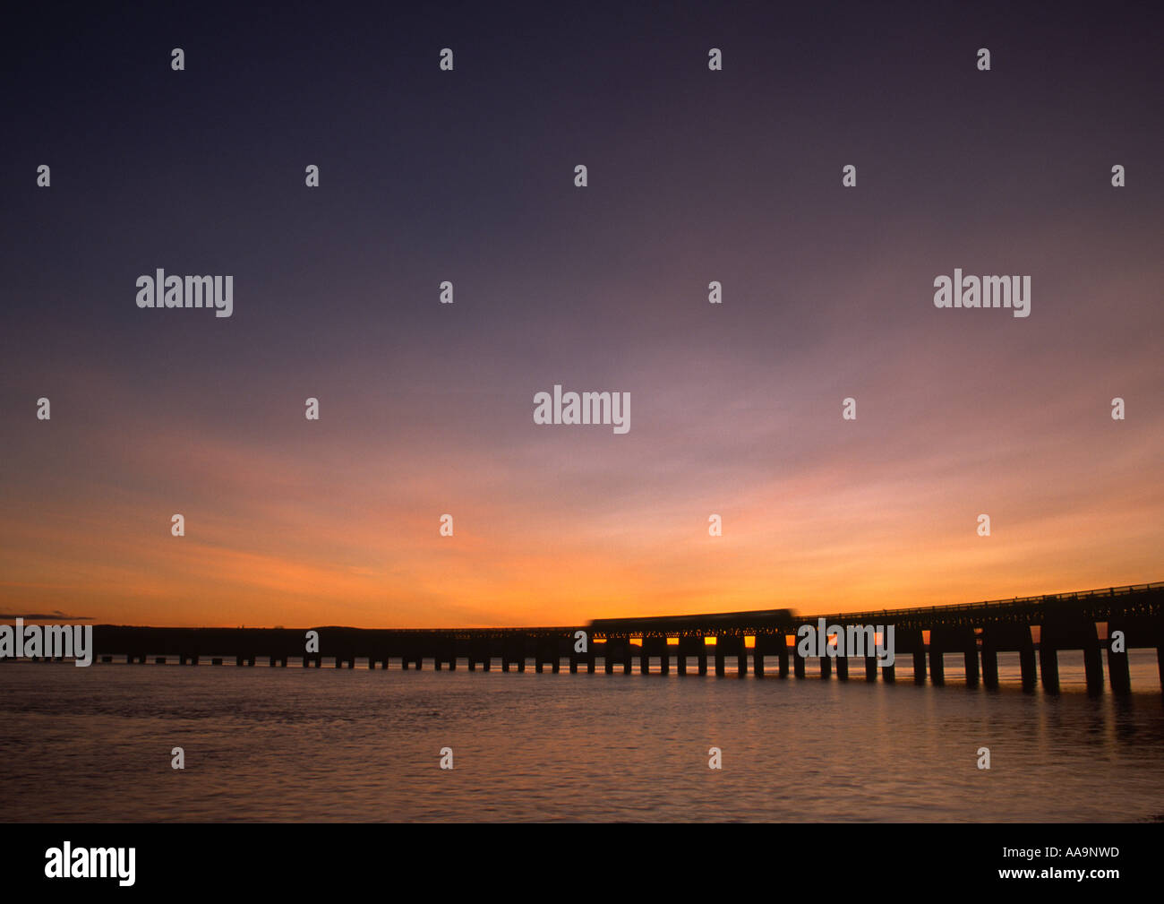 Tay Rail Bridge with Train, Scotland Stock Photo