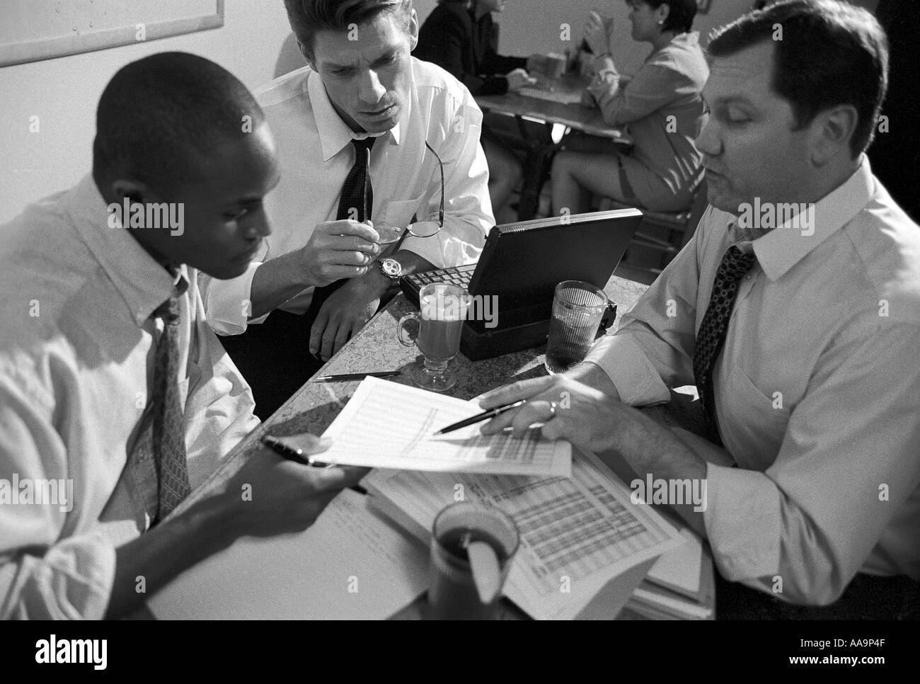 Group of business executives in a meeting Stock Photo