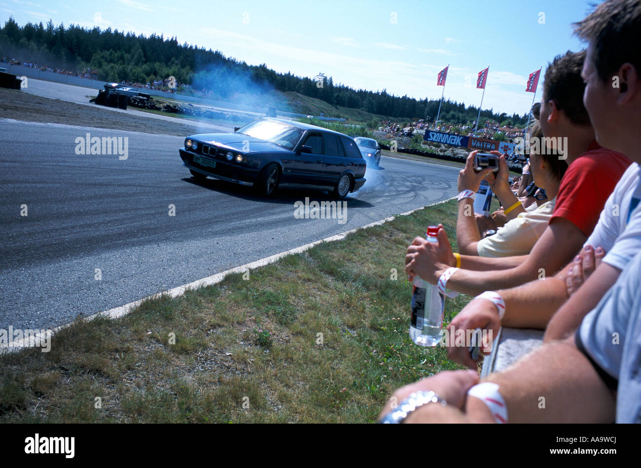 5 Series BMW skidding with the back end out at the street racing event Gatebil at Rudskogen in Norway Stock Photo