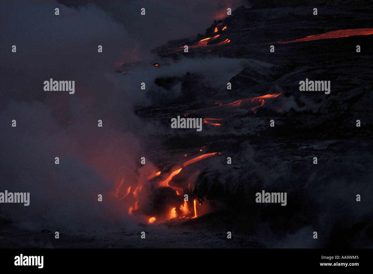Lava flowing into the Pacific Ocean Volcanoes National Park Big Island Hawaii Stock Photo