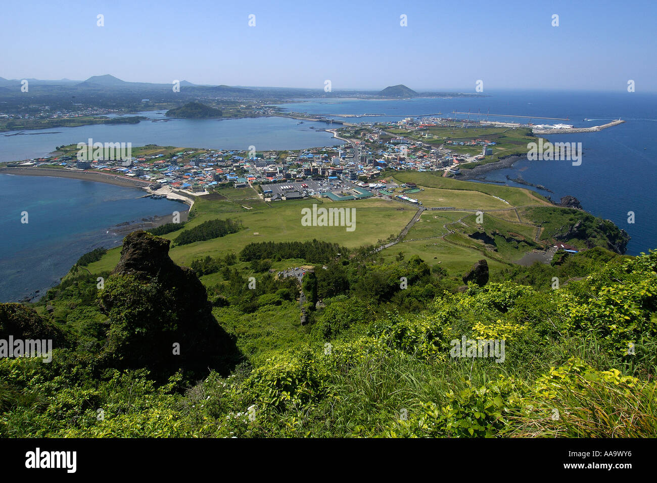 Village of Seongsan at the foot of Ilchulbong a volcanic cone Jeju island South Korea East Sea (Sea of Japan) Stock Photo