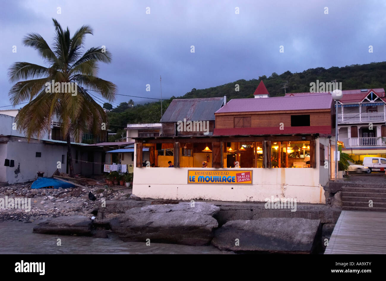 A restaurant at the ocean front of Deshaies, Guadeloupe FR Stock Photo