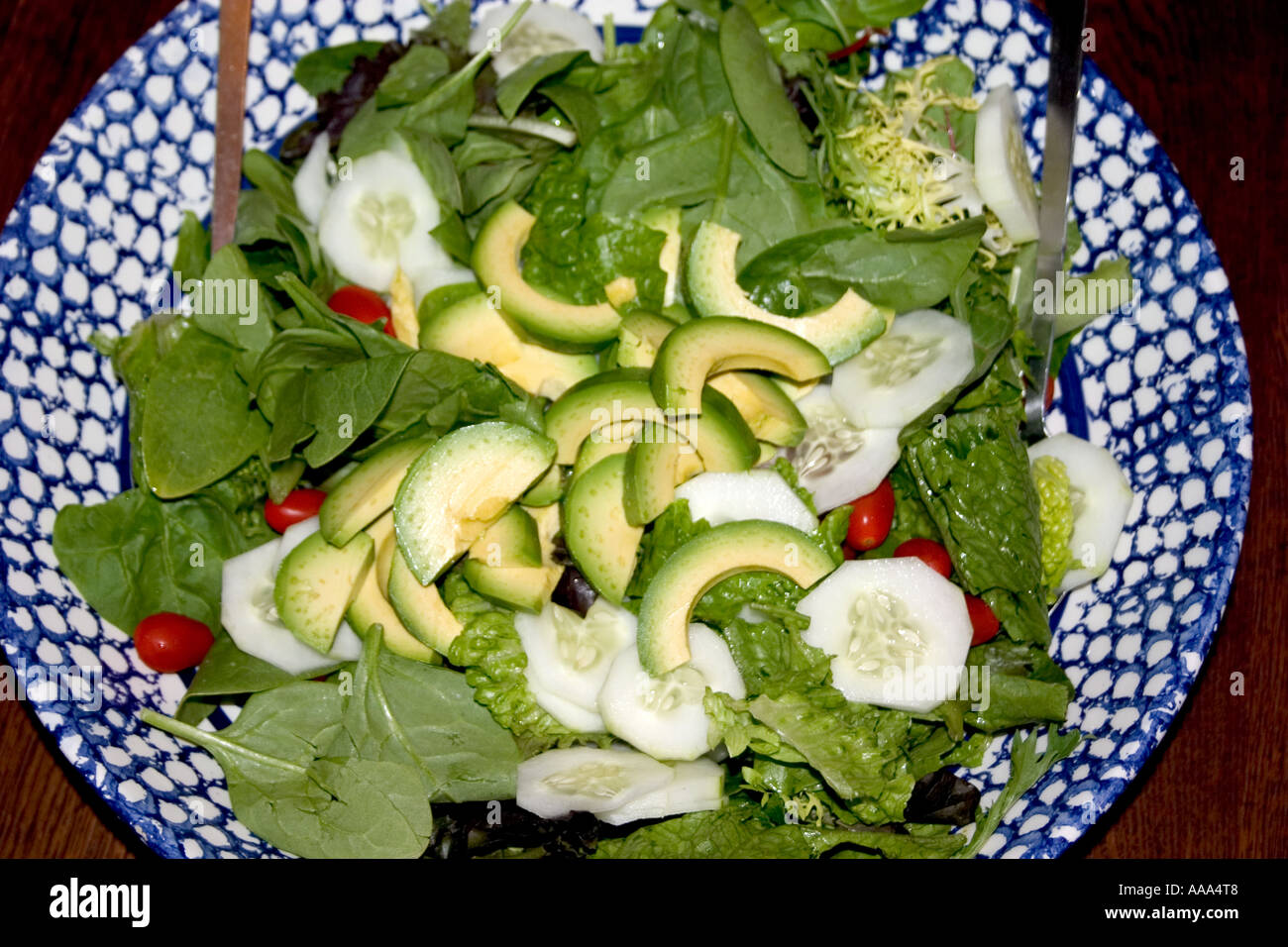 Salad bowl of avocados spinach cherry tomatoes cucumbers and lettuce  healthy food concept. St Paul Minnesota MN USA Stock Photo - Alamy