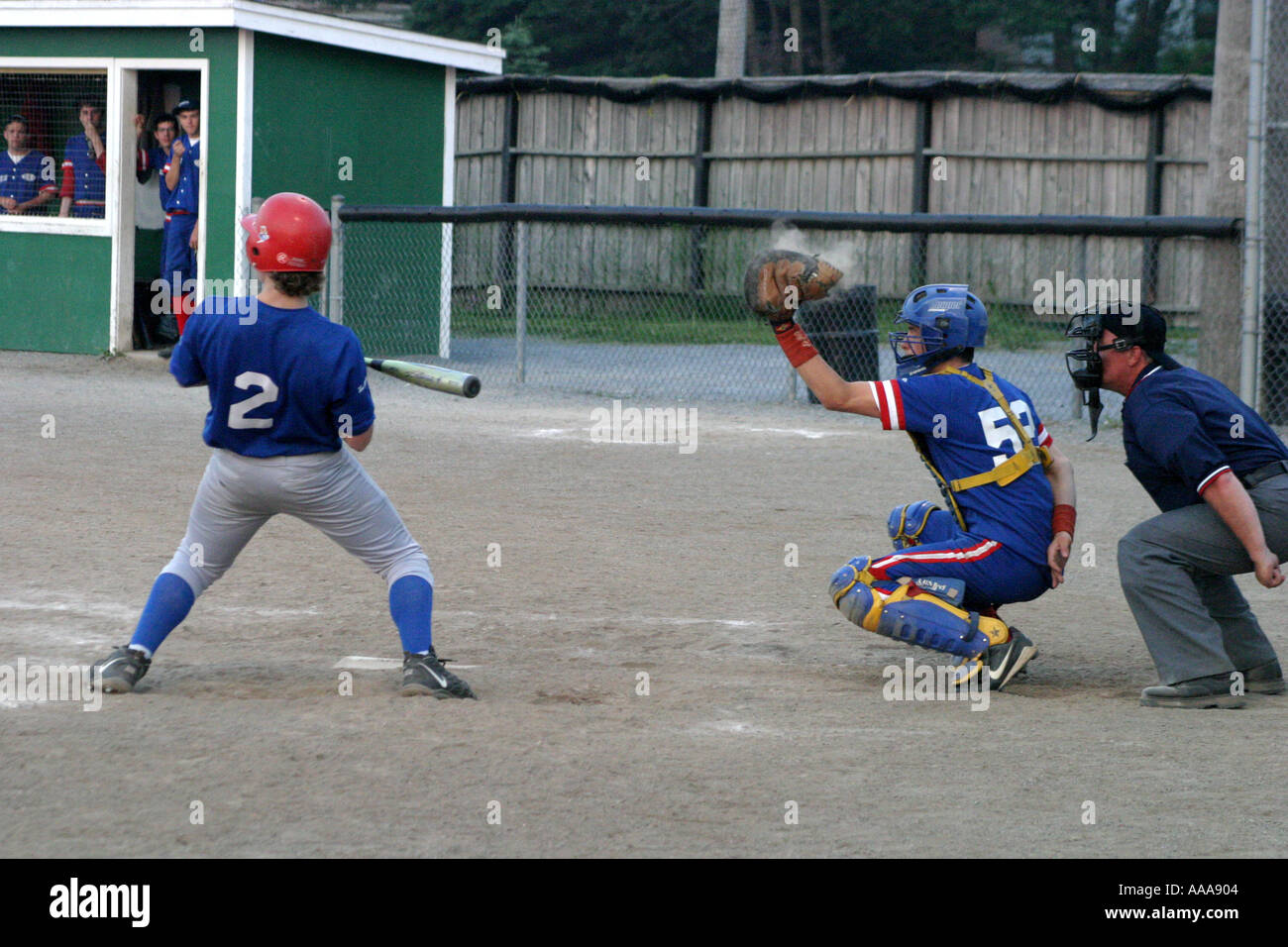 Baseball batter almost hit by pitch ball dusty catcher glove umpire