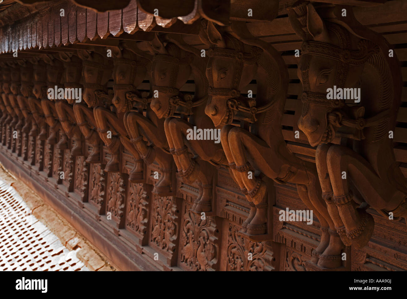 India Kerala Trivandrum Puthe Maliga Palace Museum  roof is held up by hundreds of carved hoses.2006 Stock Photo