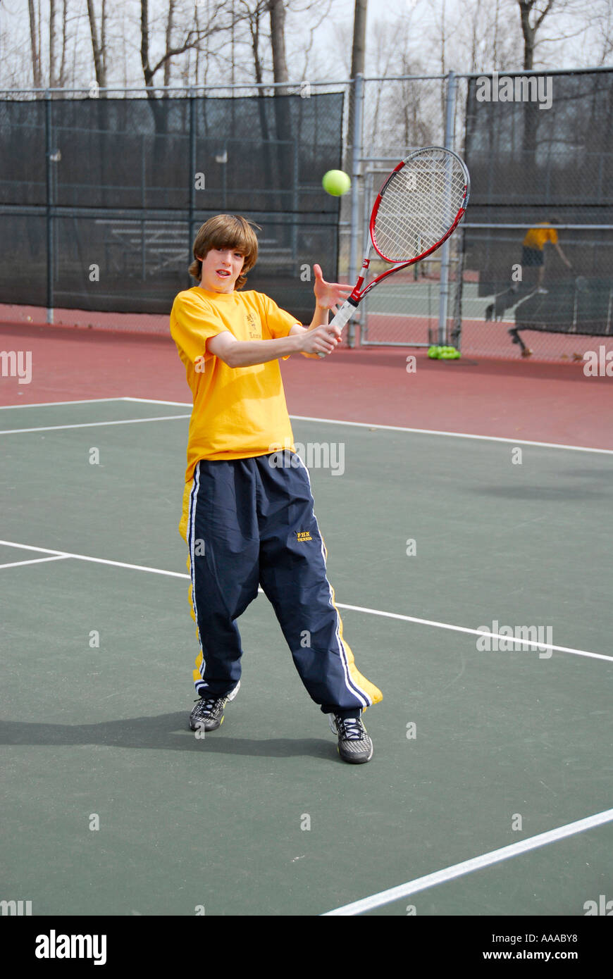 High School Tennis Action Stock Photo