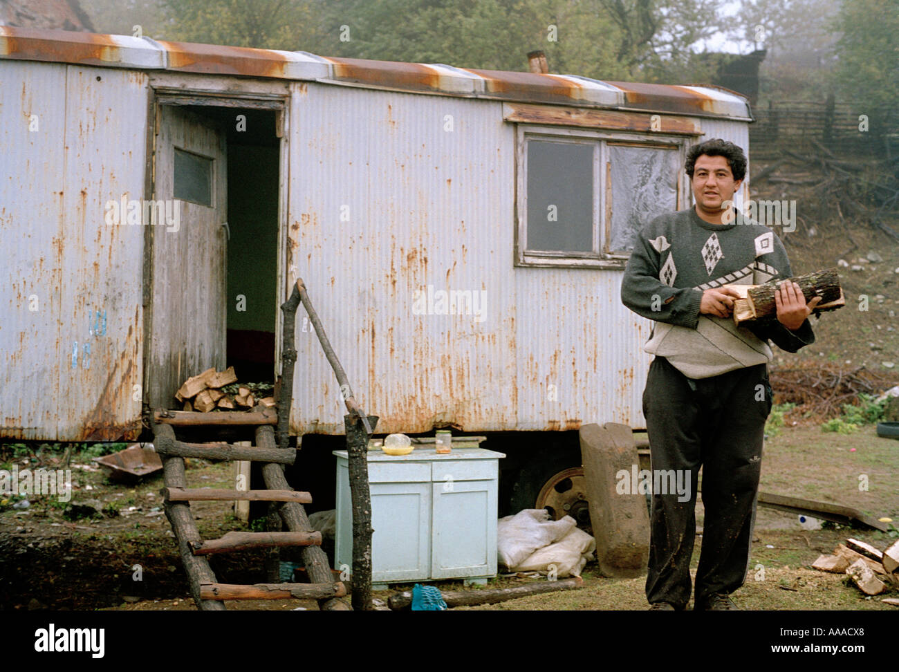 migrant worker outside the family home living on the Bulgaria Turkey border Stock Photo