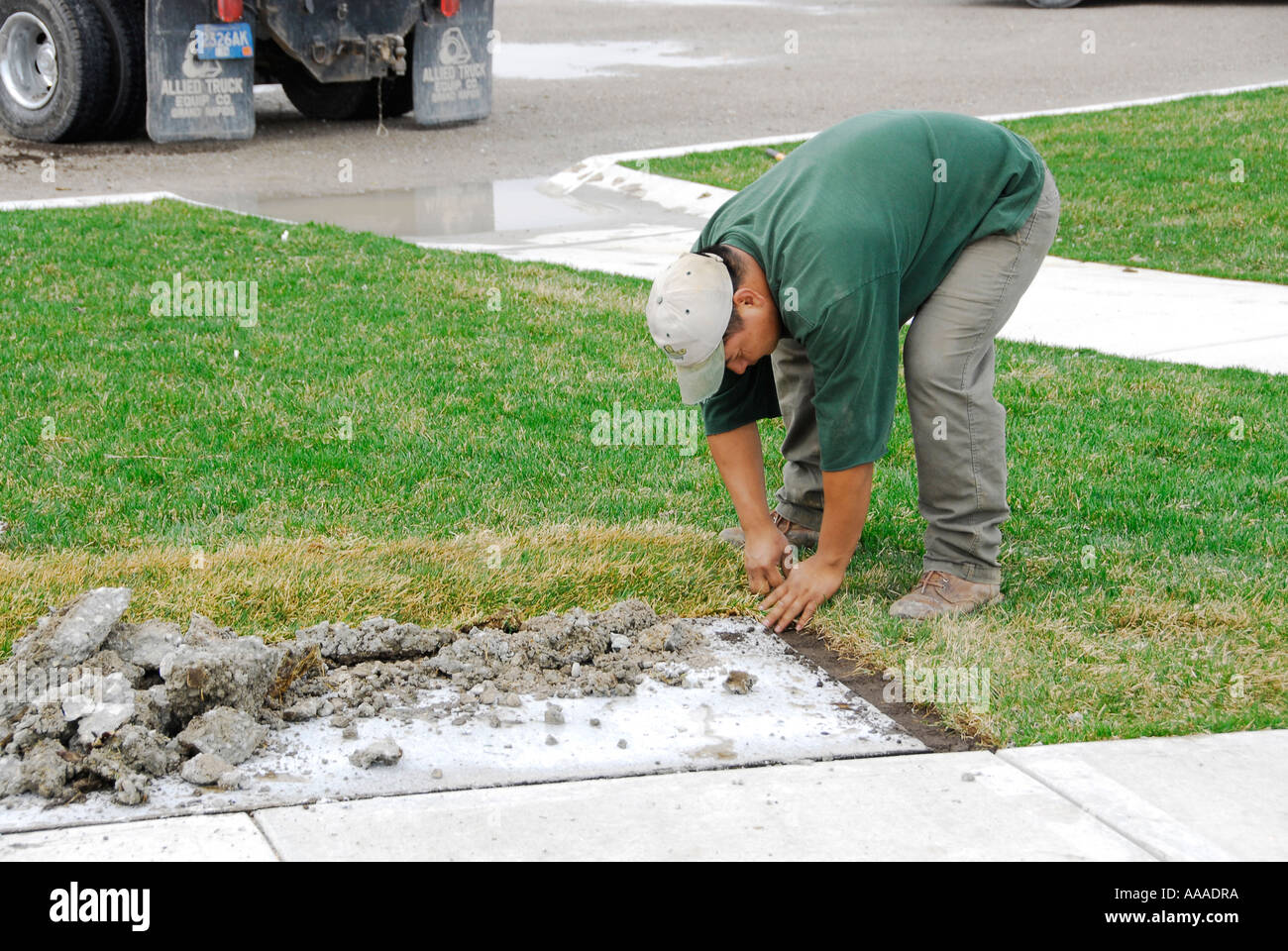 Ethnic man works on landscaping project Stock Photo