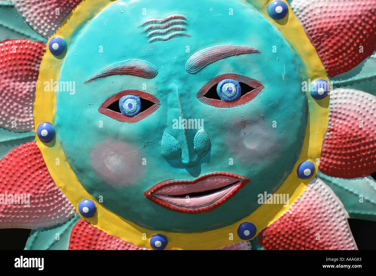Florida, sun symbol, face, art, decoration, metal eyes, lips, Stock Photo