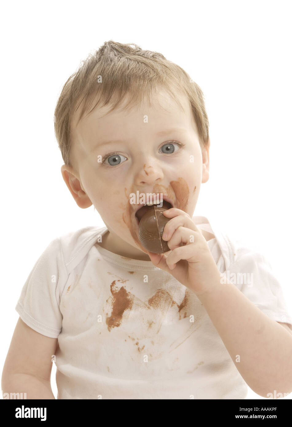 Toddler eating Easter Egg Stock Photo Alamy