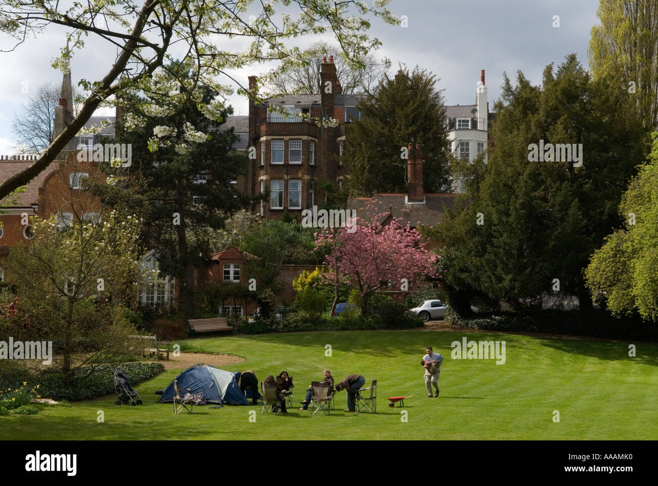 Hampstead village London NW3 England. Families playing with children in "Gainsborough Gardens
