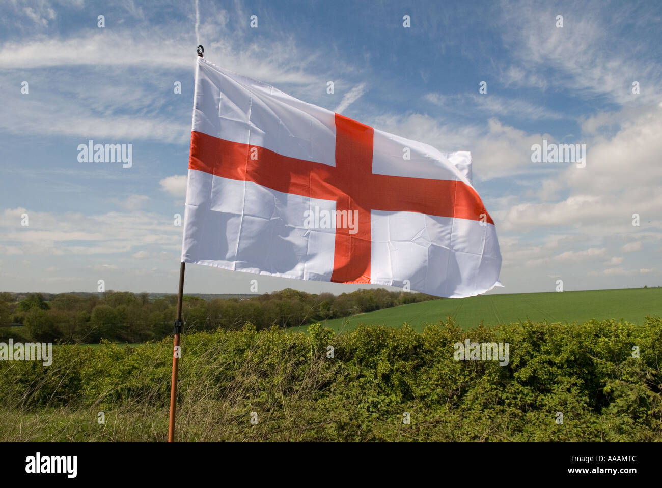Red cross on a white background The English flag of St George in the Kent countryside England HOMER SYKES Stock Photo