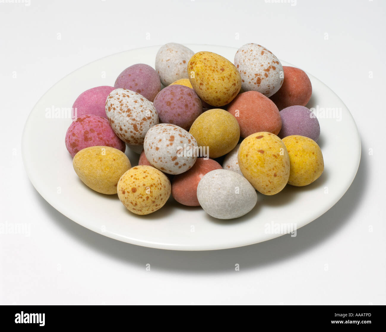 Chocolate eggs on plate Stock Photo