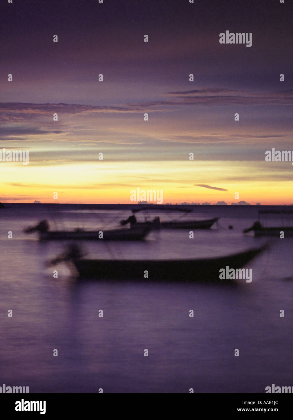 Fishing Boats At Sunset Stock Photo