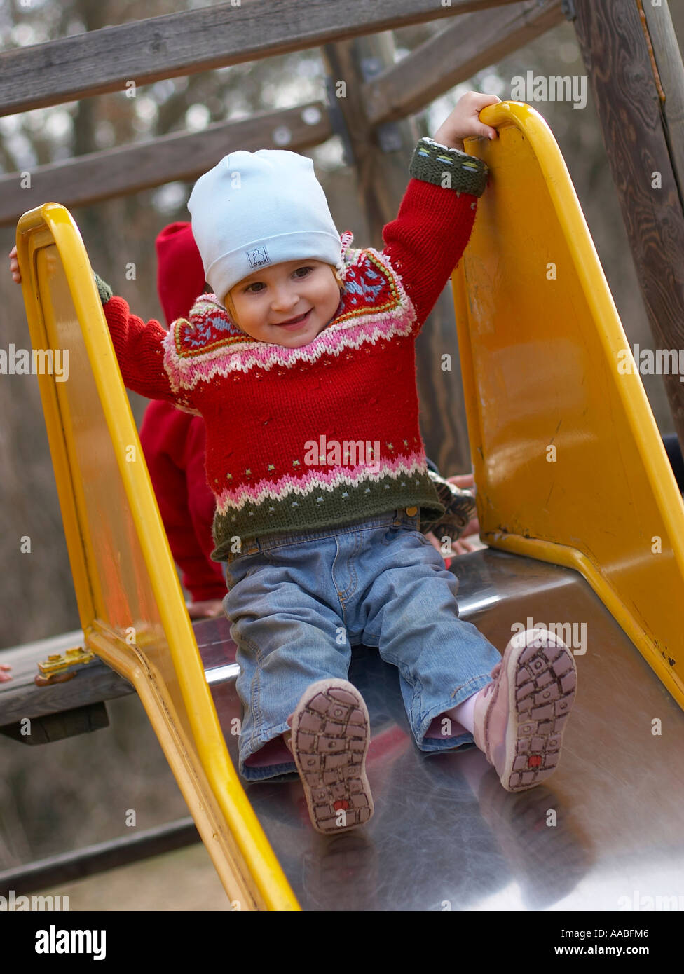little girl on slide Stock Photo Alamy