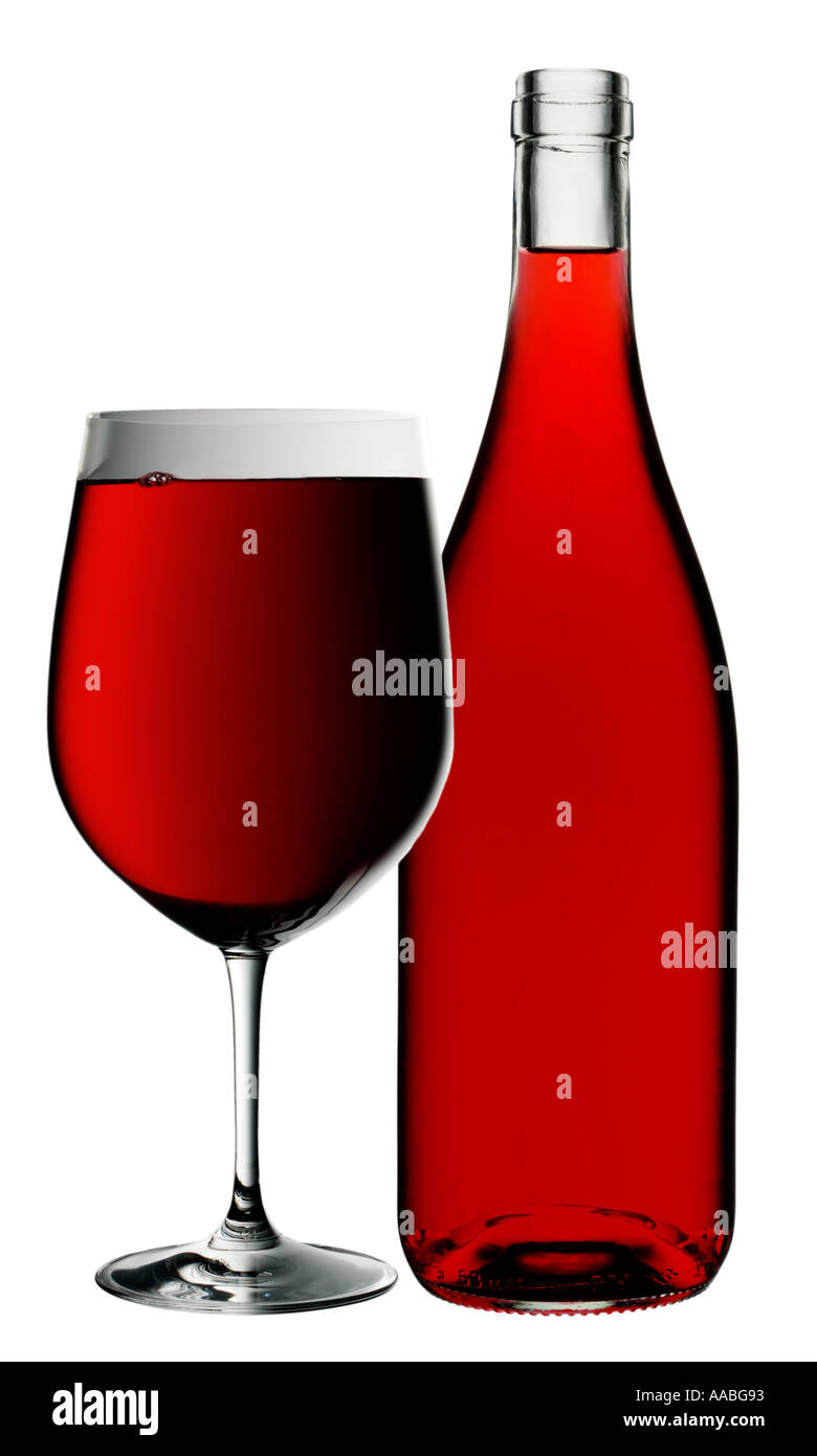 RED WINE IN GLASS AND BOTTLE Stock Photo