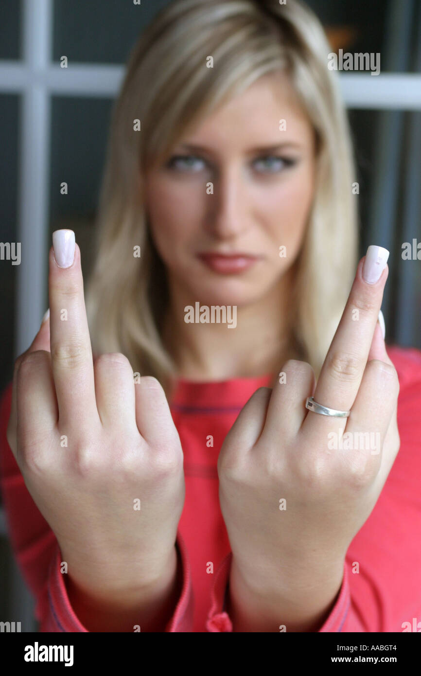 woman shows the stinking finger Stock Photo