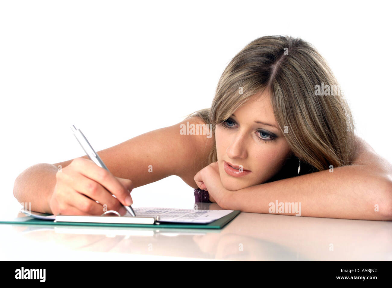 Woman writes Stock Photo