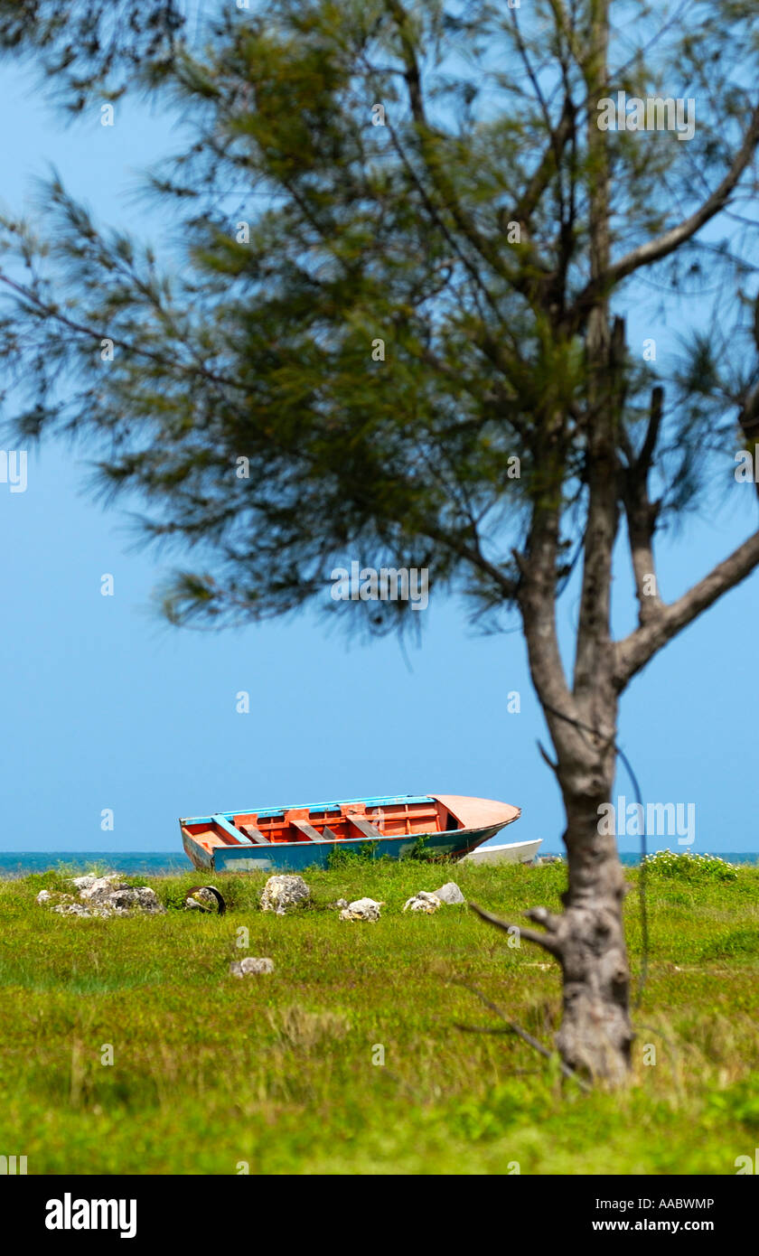 An orange boat at the coast of Petit-Canal, Guadeloupe FR Stock Photo