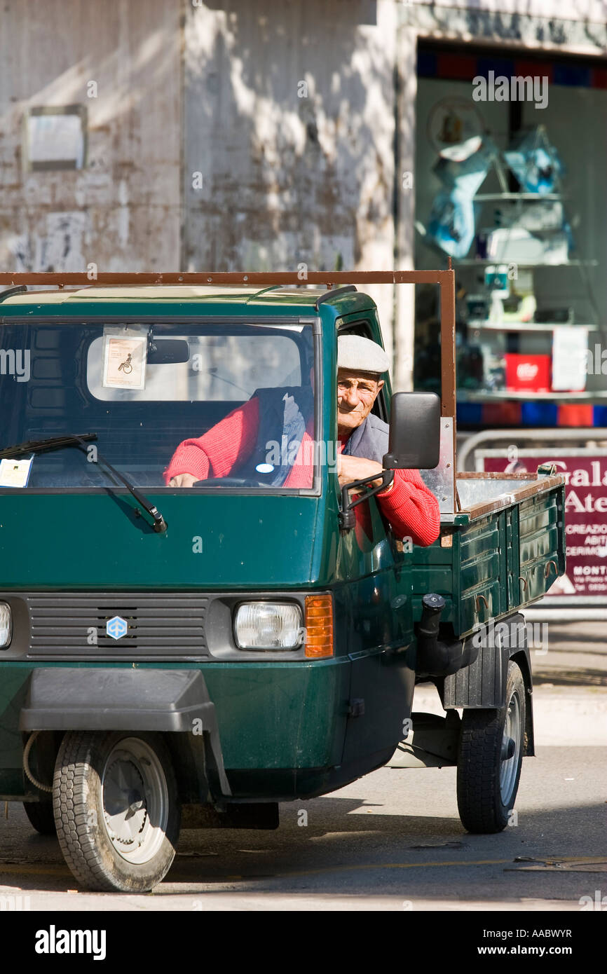 Italian man driving an three wheeled Piaggio Ape utility vehicle Matera  Basilicata Italy Stock Photo - Alamy