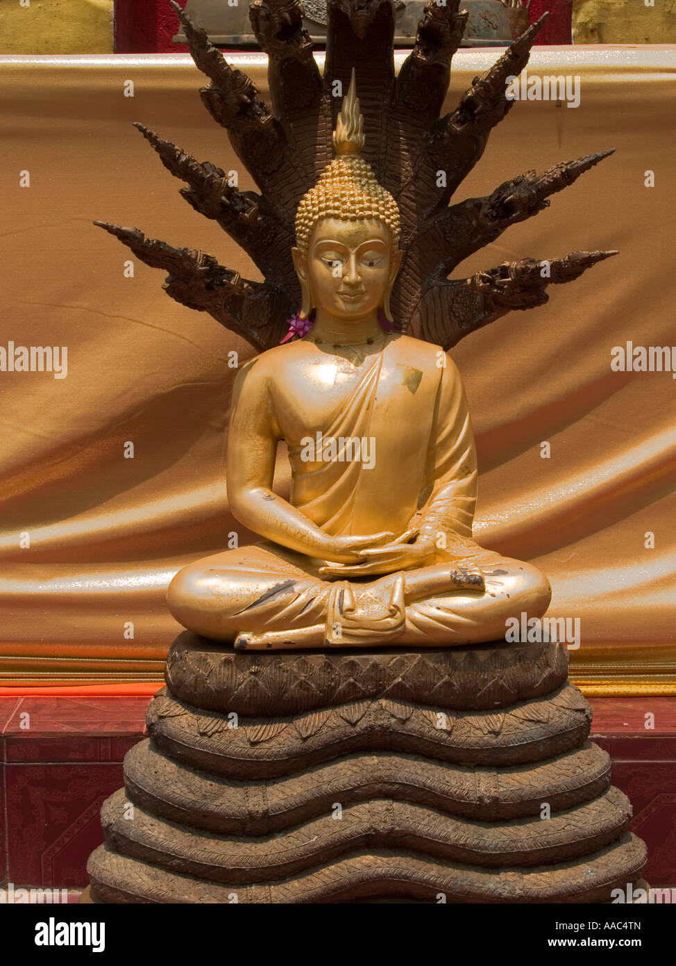 golden seated Buddha statue Wat Phra That Doi Wow Stock Photo - Alamy