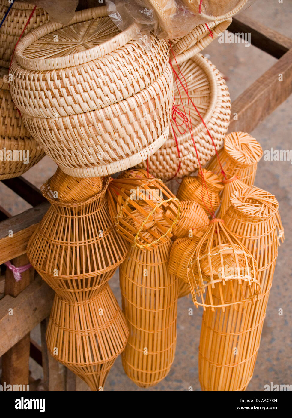 bamboo fishing baskets and sticky rice baskets made by artisans for sale in  Vientiane Laos Stock Photo - Alamy