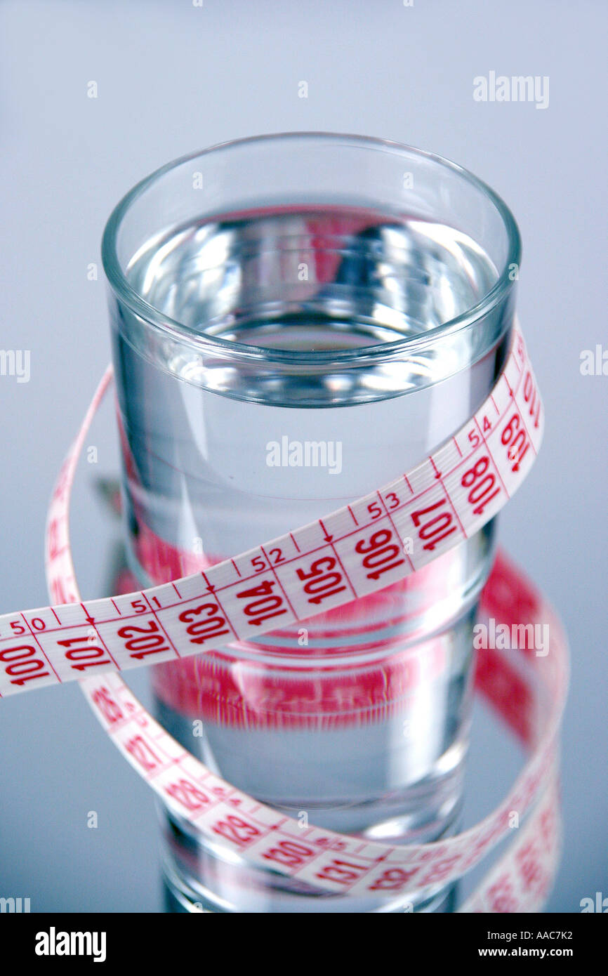 Mineral water with measuring tape Stock Photo