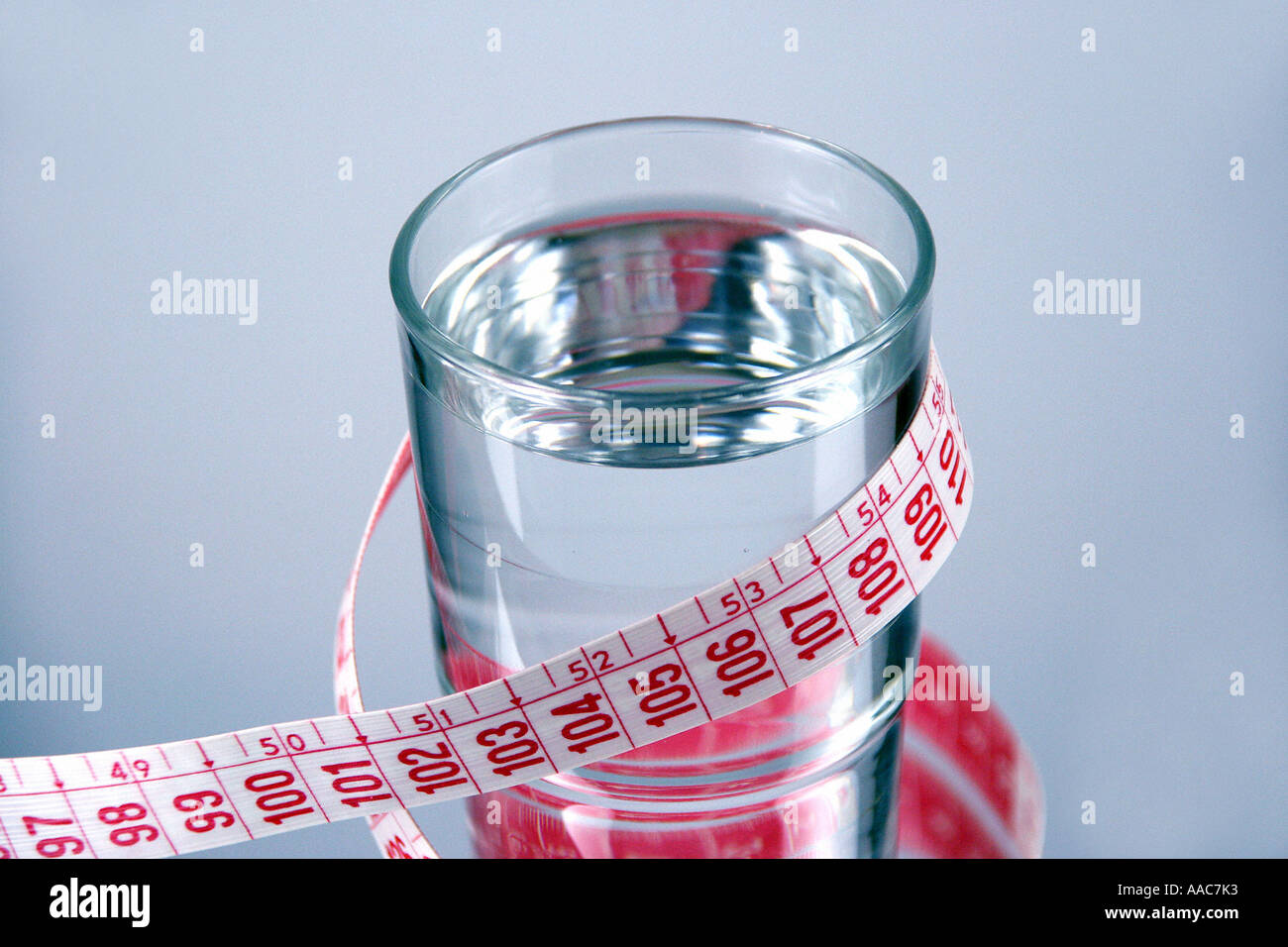 Mineral water with measuring tape Stock Photo