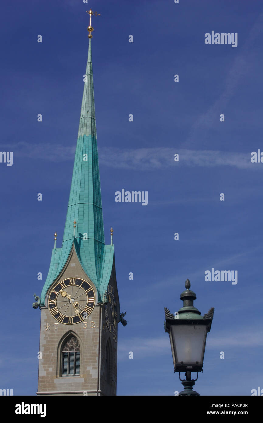 Church tower of the Fraumuenster (Frau cathedral) with street lamp in Zurich, Switzerland Stock Photo