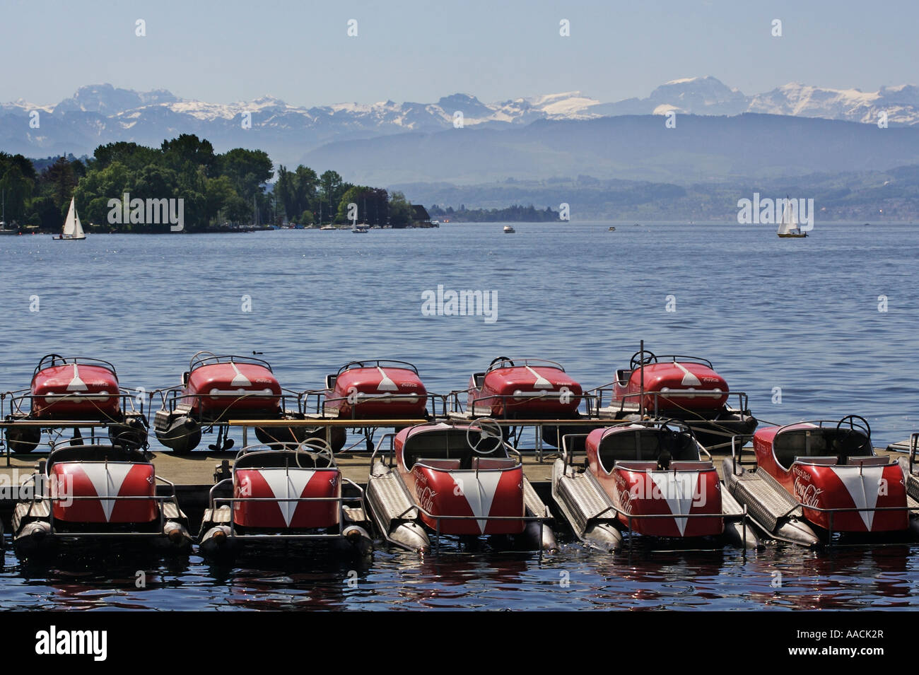 Zurich lake with pedal boats and Alp panorama, near Zurich, Switzerland