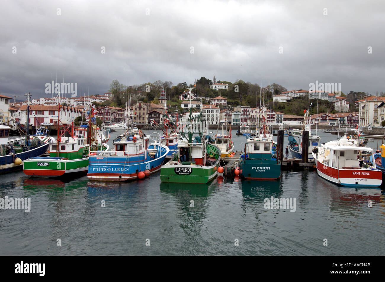 fishing cutter at the fishing port at a rainy day in St Jean de Luz and in Ciboure Pyrenees Atlantiques France Stock Photo