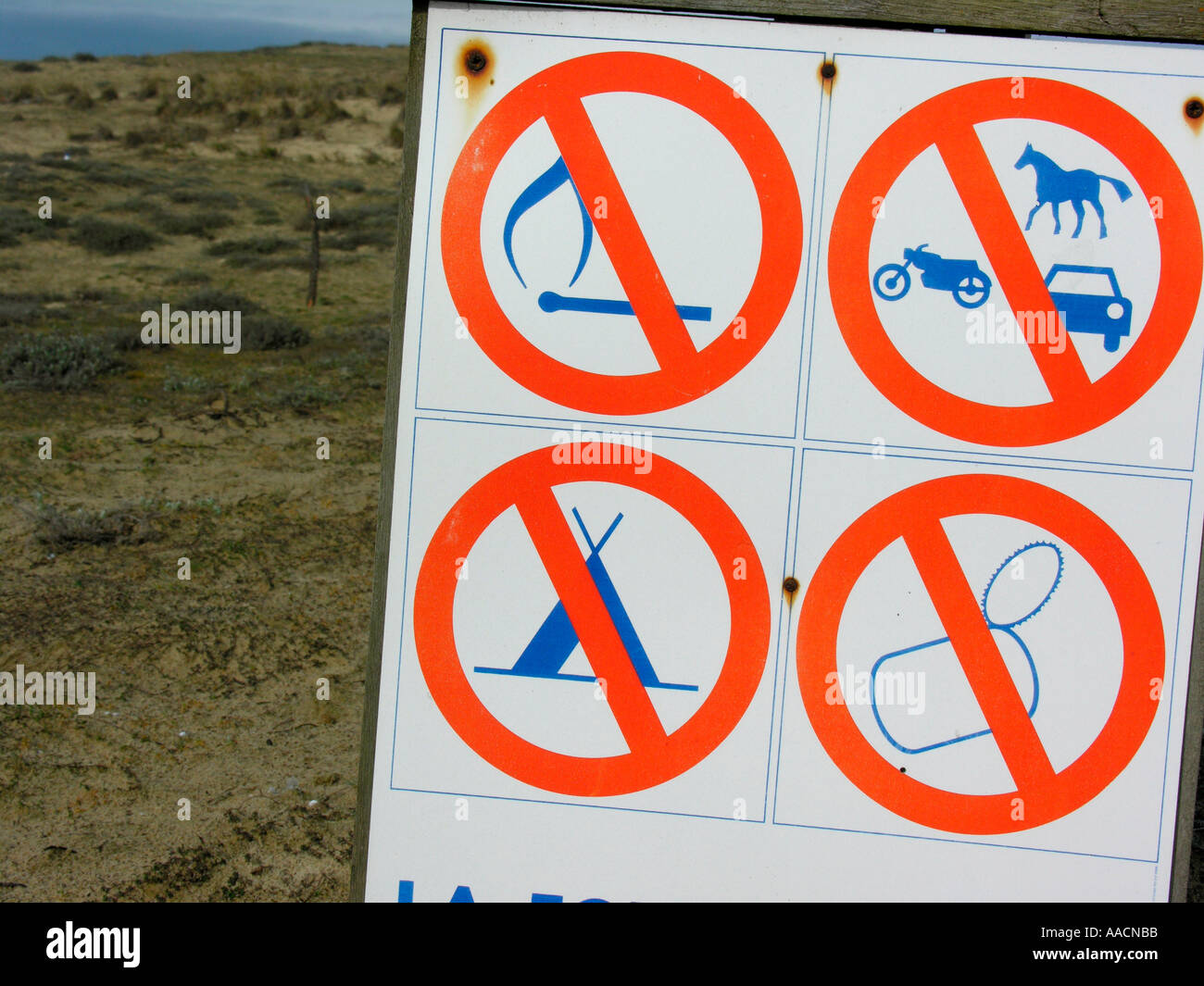 prohibition signs on dunes at the beach of Atlantic ocean in France Stock Photo