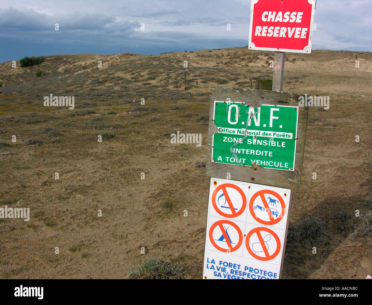 prohibition signs on dunes at the beach of Atlantic ocean in France Stock Photo