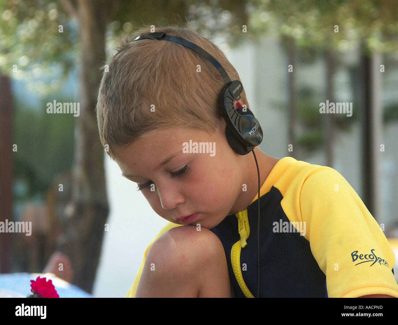 boy hears music Stock Photo