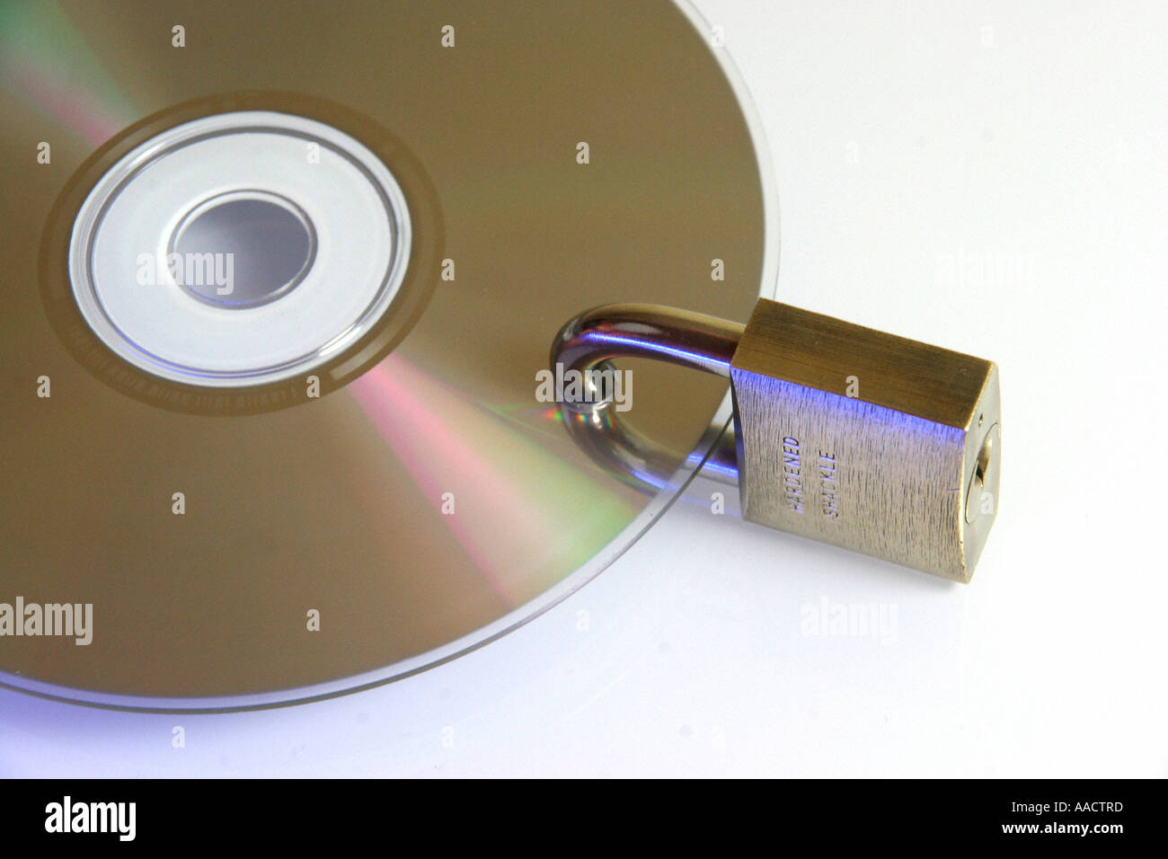 Symbol data security, CD ROM with lock Stock Photo - Alamy