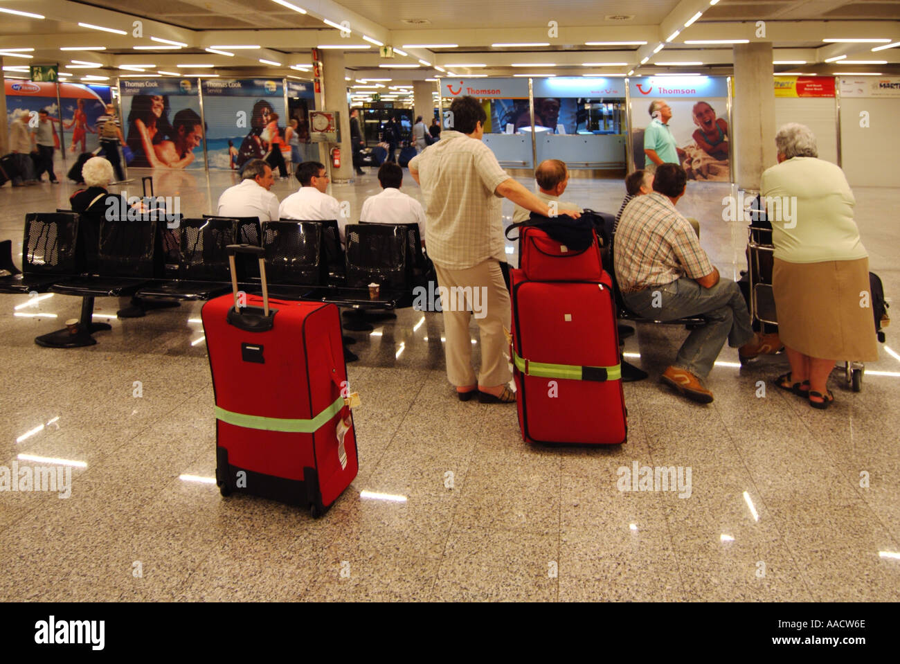 Palma airport Majorca holidaymakers waiting for onward transport Stock Photo