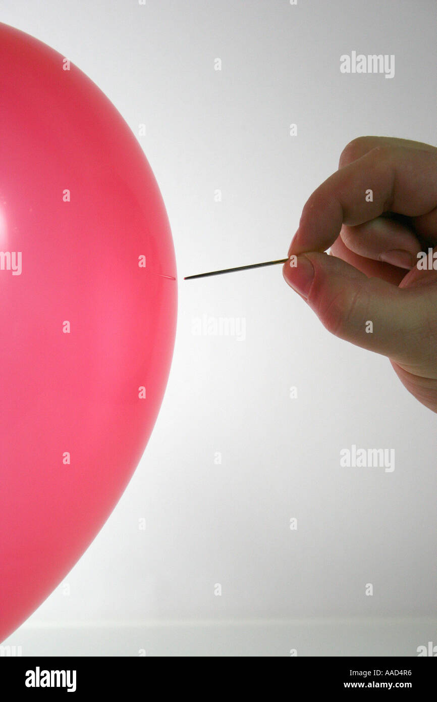 balloon with needle Stock Photo Alamy