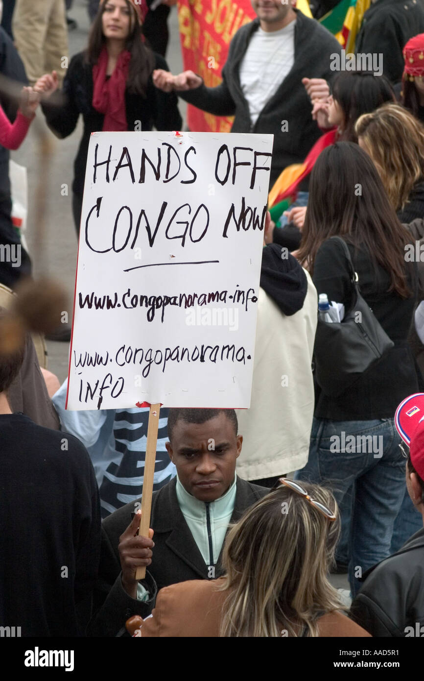 Congo independence protestor with banner during May Day demonstration. Trafalgar Square, London, England Stock Photo