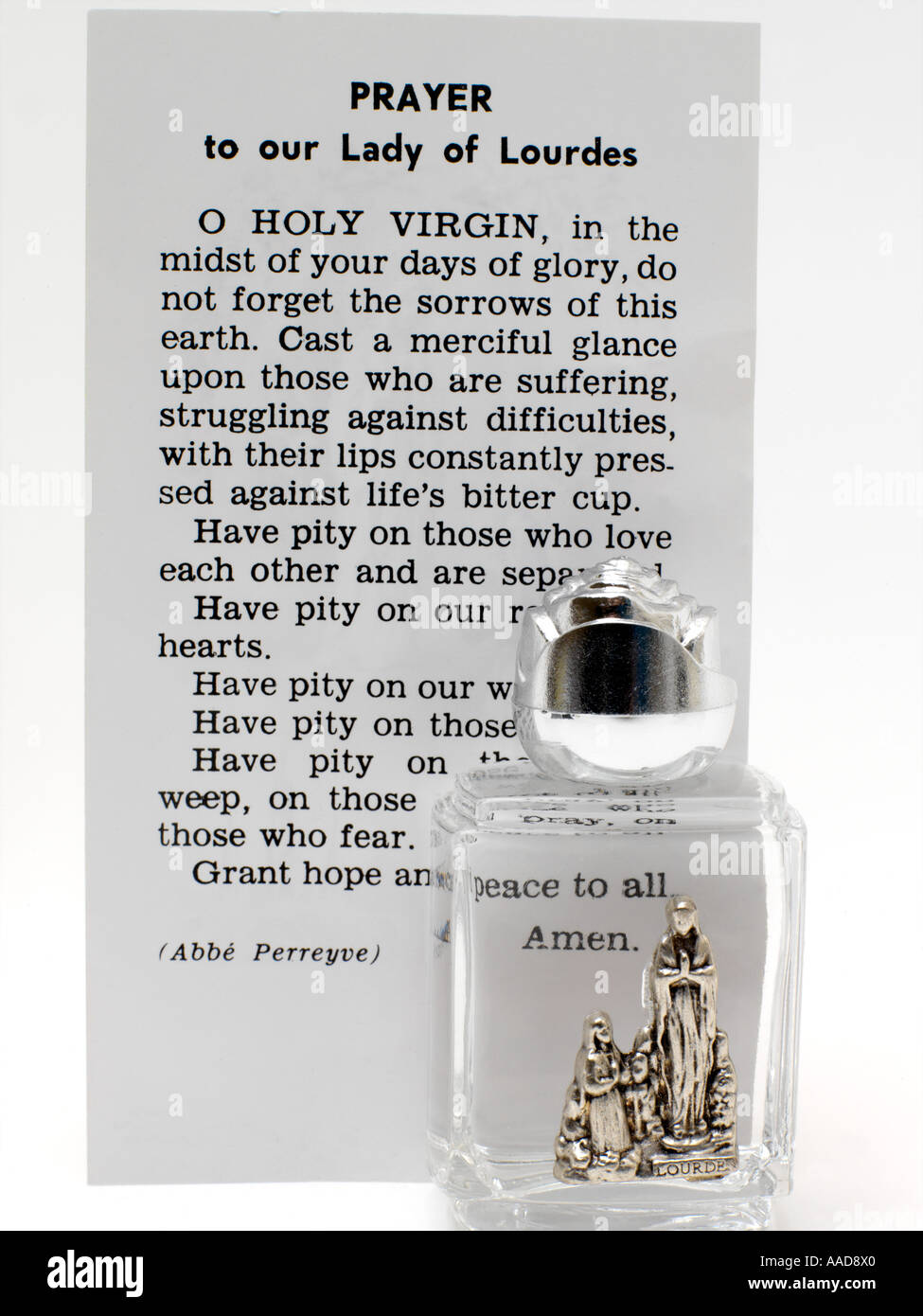 Holy Water from Lourdes with Prayer to Our Lady of Lourdes Stock Photo