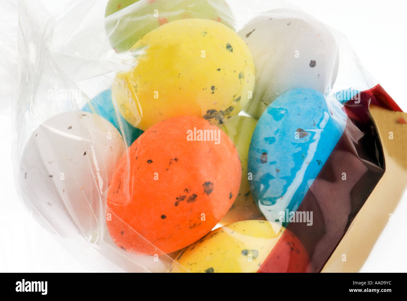 sugar coated chacolate easter eggs sugar candy cellophane packaged in shrill colors Stock Photo