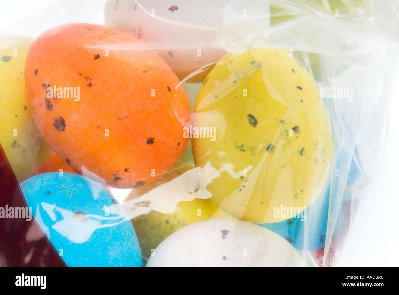 sugar coated chacolate easter eggs sugar candy cellophane packaged in shrill colors Stock Photo