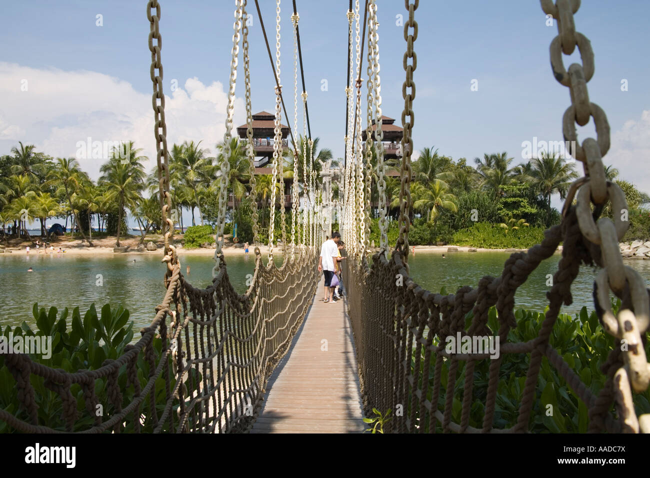 SINGAPORE ASIA May Visitors crossing the narrow rope bridge towards the