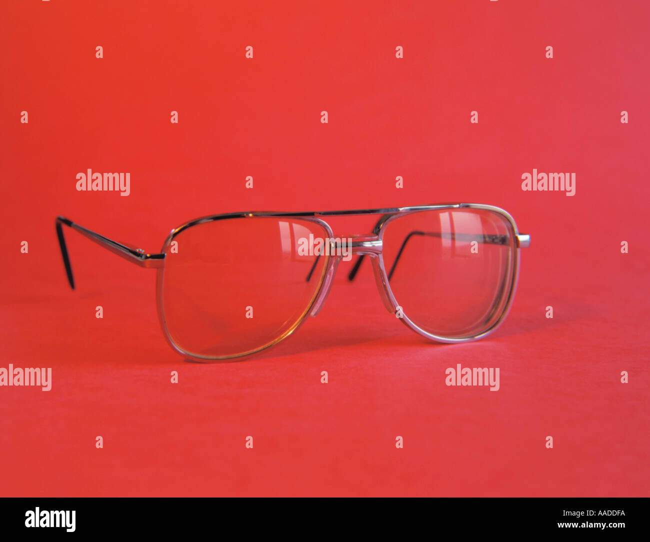 Pair of metal framed spectacles Stock Photo