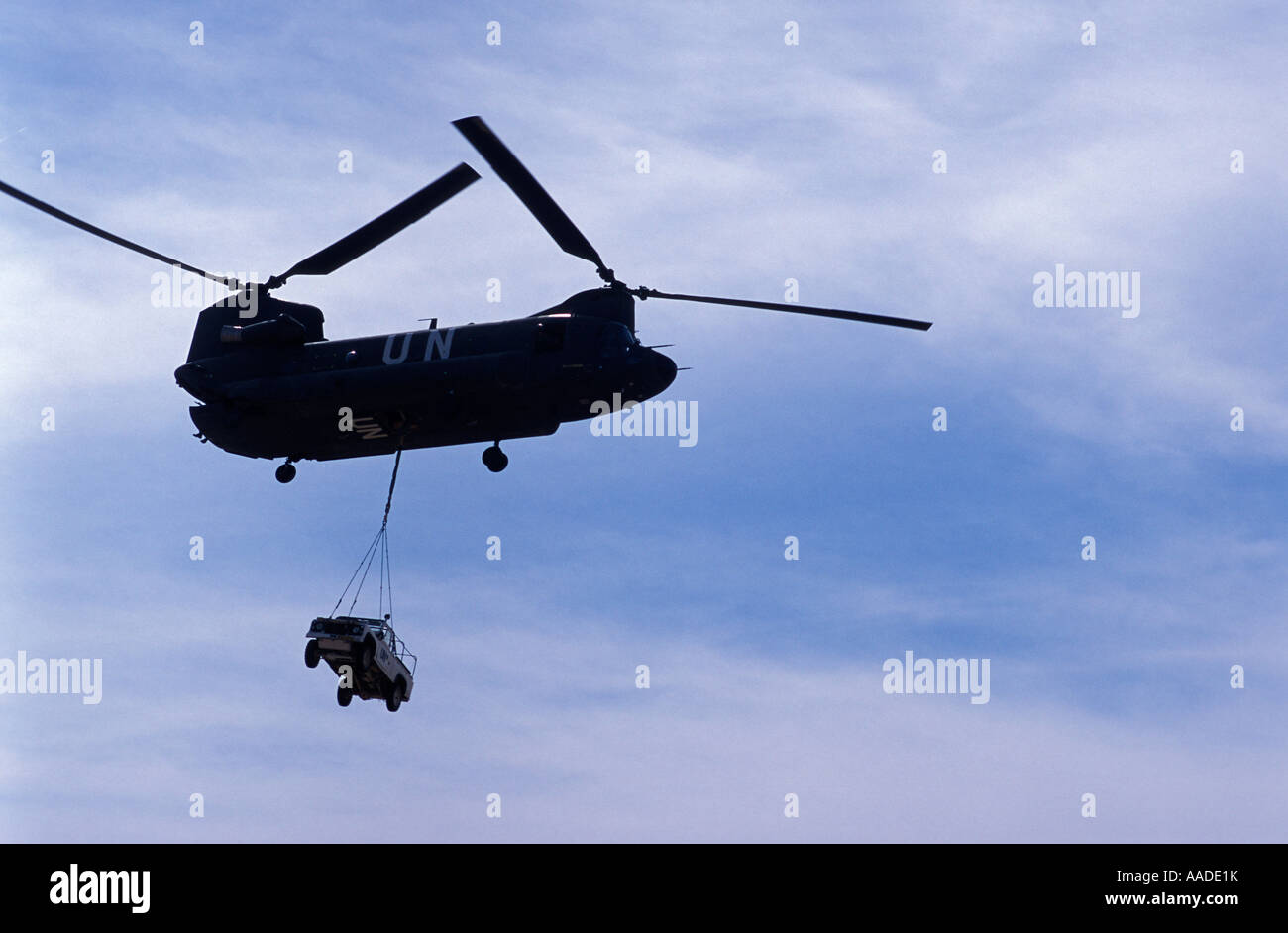 UN helicopter lifting jeep in desert camp in Eritrea during border ...