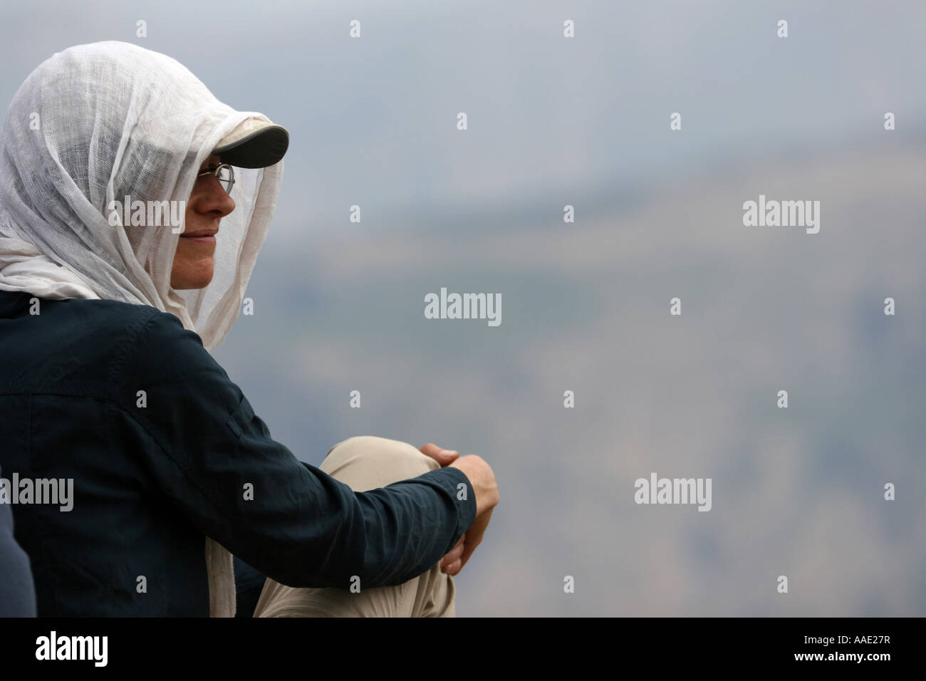 Trekker and park guide overlooking view while trekking in the Simien Mountains National Park, Ethiopia, Africa Stock Photo