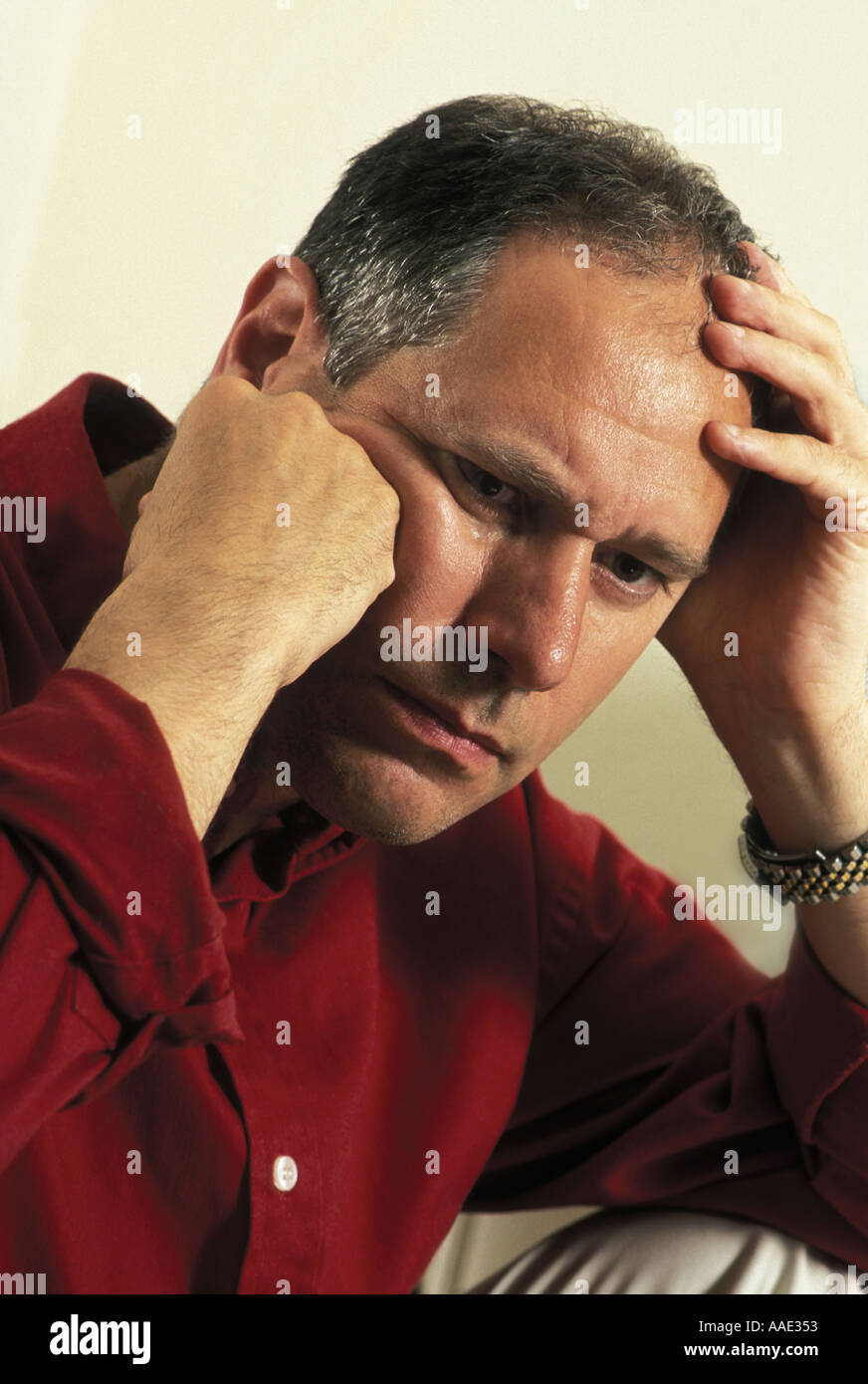 unhappy man in thoughtful depression or stress Stock Photo