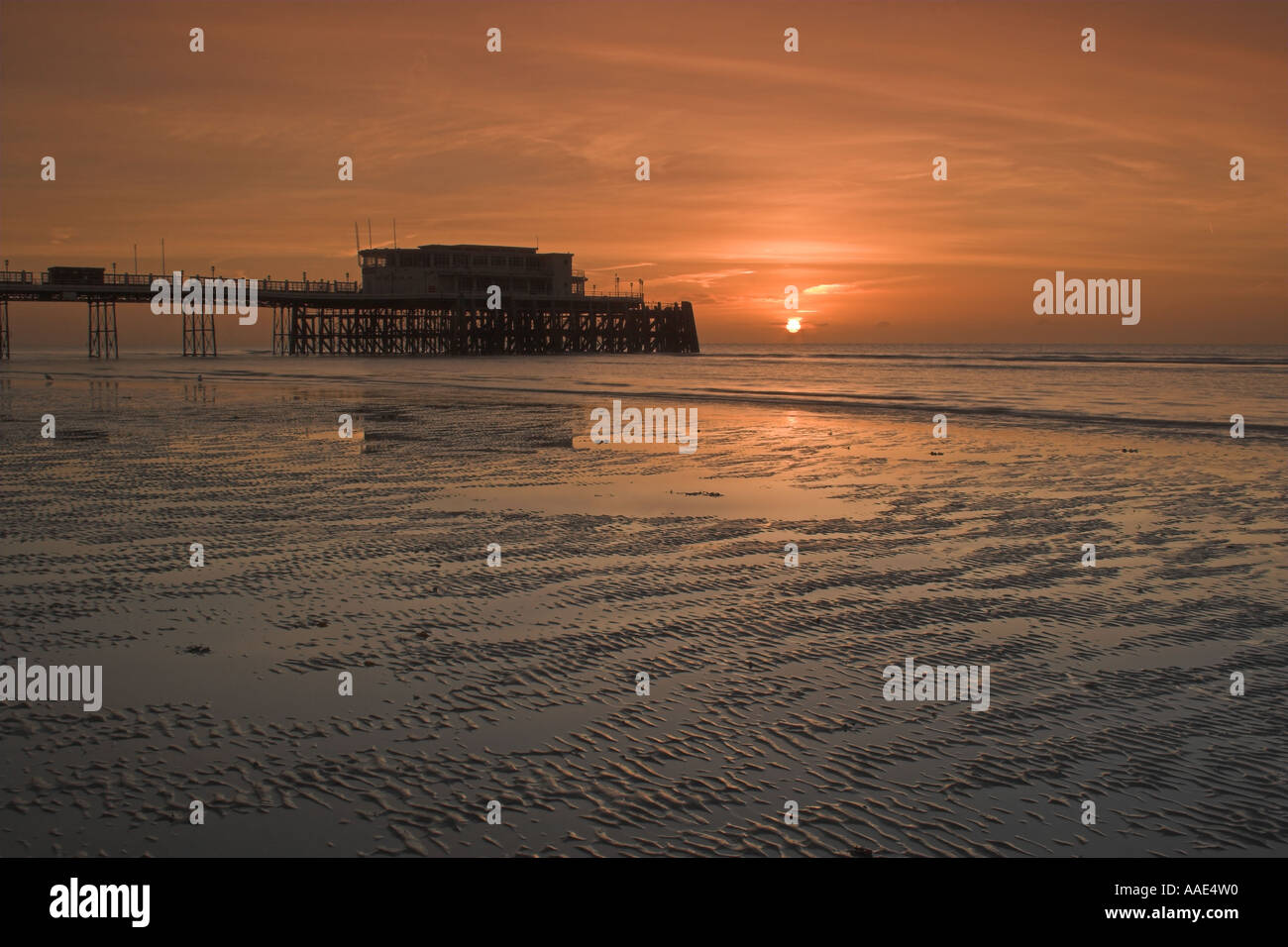 Worthing Pier at sunrise - Worthing, West Sussex, England,  UK Stock Photo