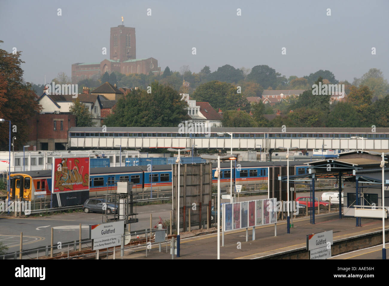 guildford railway station cathedral beyond surrey england uk gb Stock Photo