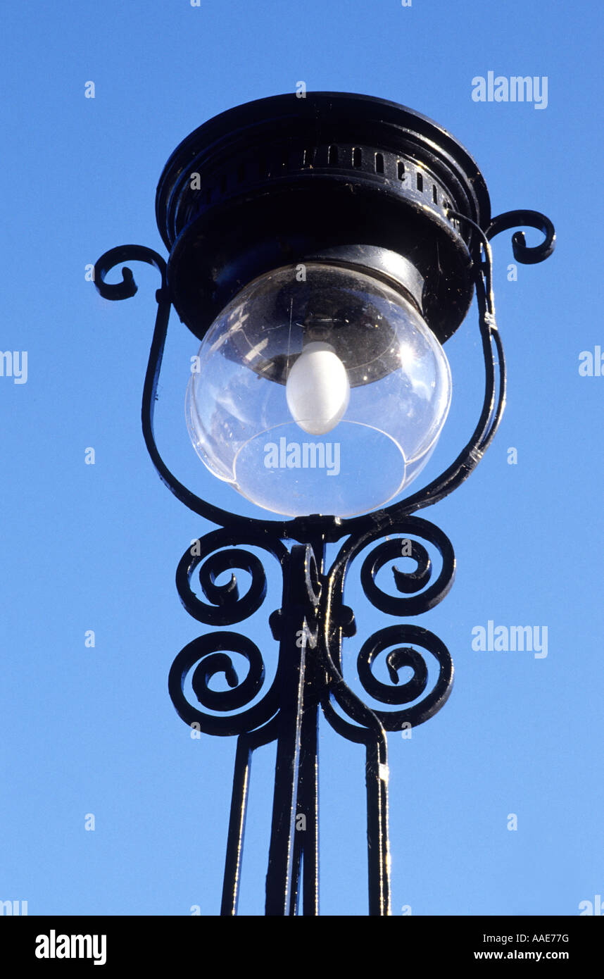 Edinburgh street lamp, feature of New Town, wrought iron standard, metal cover over glass bowl, Scotland, UK Scottish lamps Stock Photo